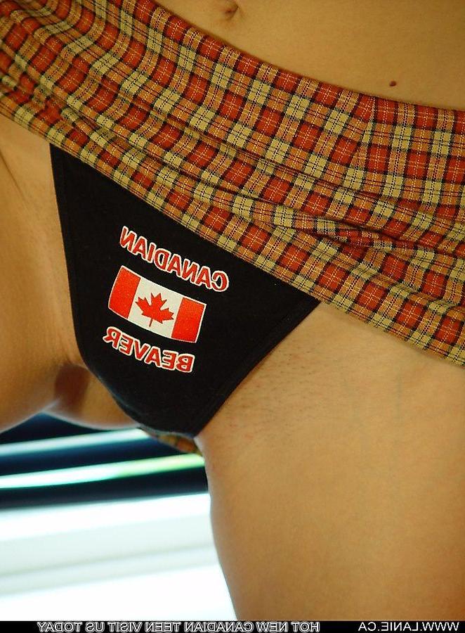 20P Pictures of teen amateur Lanie.ca showing her hot boobies