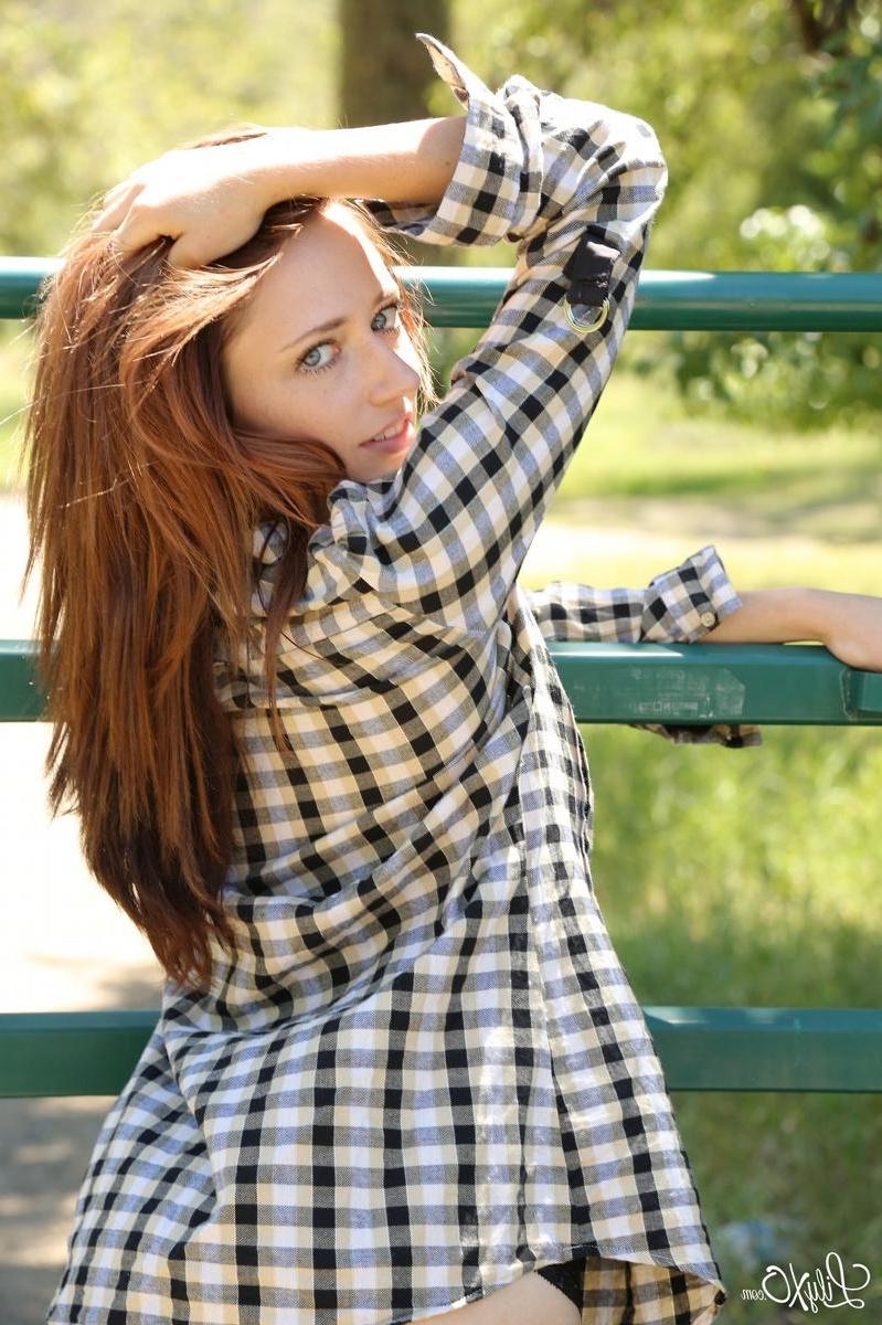 15P Lily Xo poses and teases on the gate