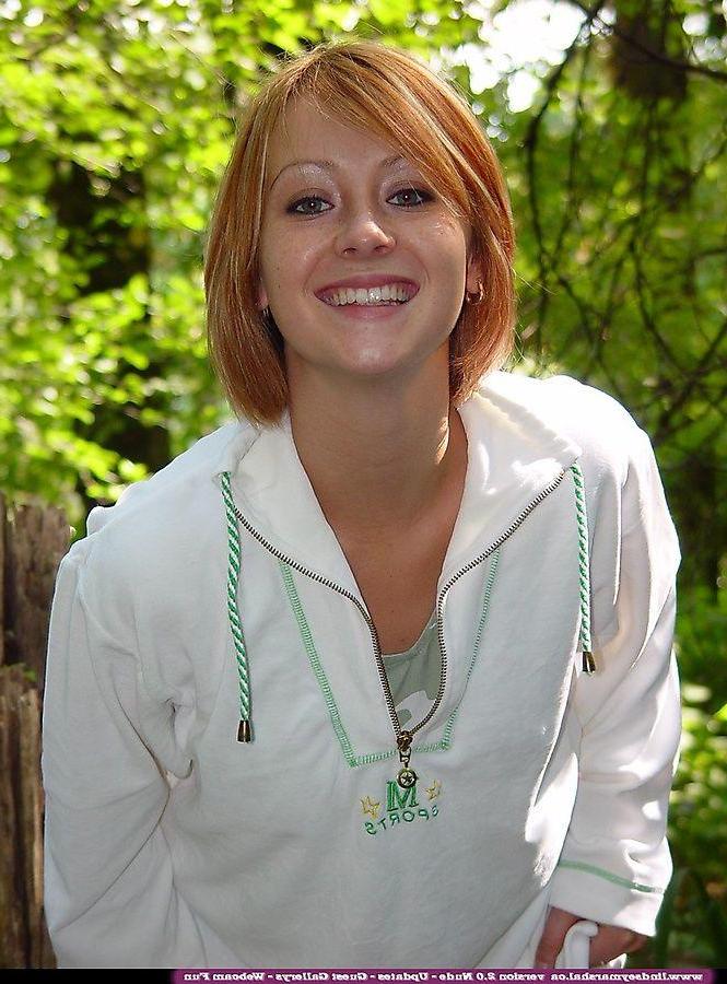 20P Pictures of teen cutie Lindsey Marshal showing her pussy in the woods