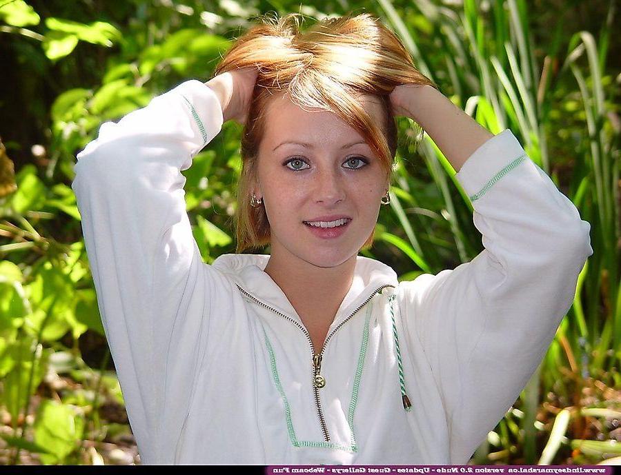 20P Pictures of teen cutie Lindsey Marshal showing her pussy in the woods