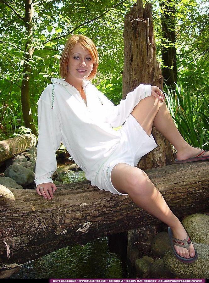 20P Pictures of teen cutie Lindsey Marshal showing her pussy in the woods