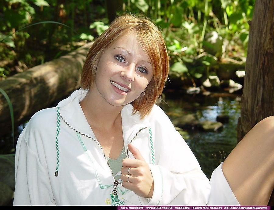 20P Pictures of teen cutie Lindsey Marshal showing her pussy in the woods