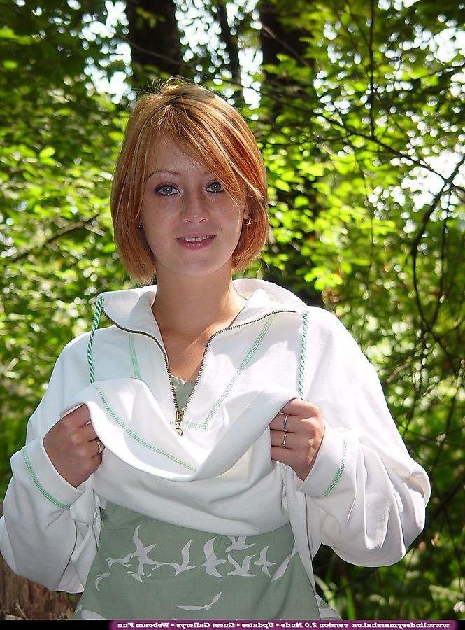 20P Pictures of teen cutie Lindsey Marshal showing her pussy in the woods