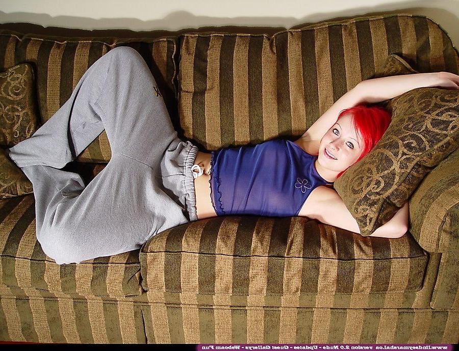 20P Pictures of teen Lindsey Marshal getting naked on her sofa