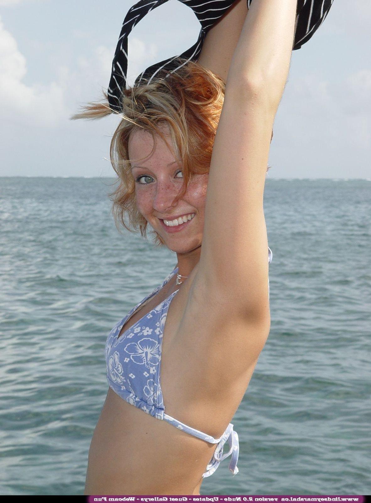 20P Pictures of teen girl Lindsey Marshal taking her clothes off outside