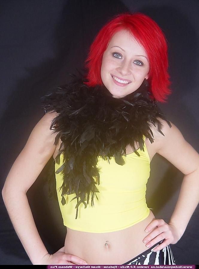 20P Pictures of teen Lindsey Marshal stripping nude with a feather boa