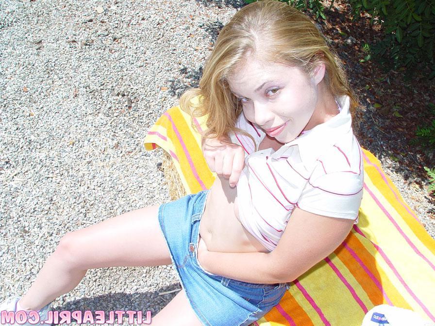 12P Blonde country girl Little April shows you what's up her skirt