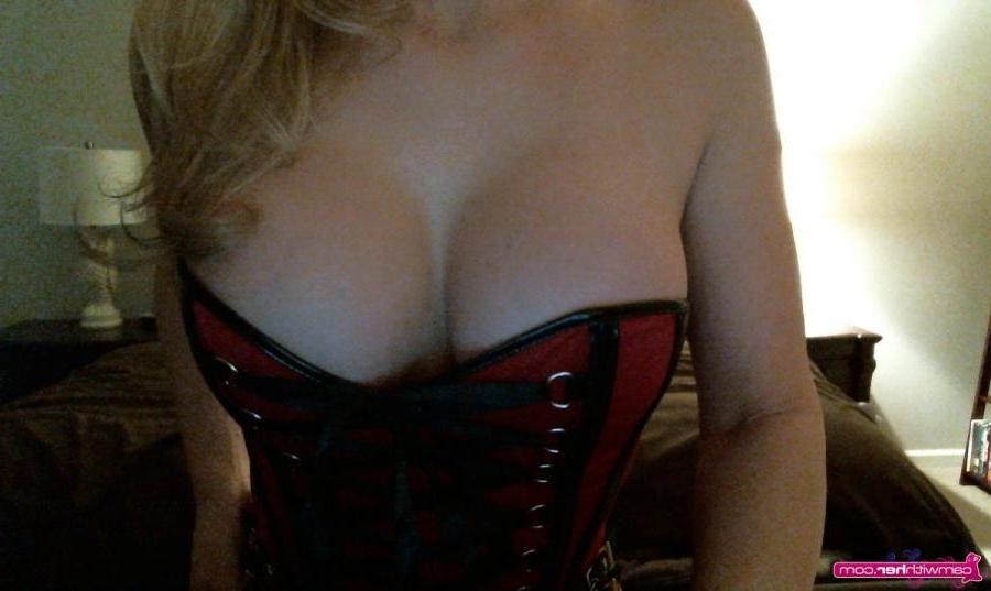 12P Blonde cam girl Natasha Adams teases in a sexy red corset