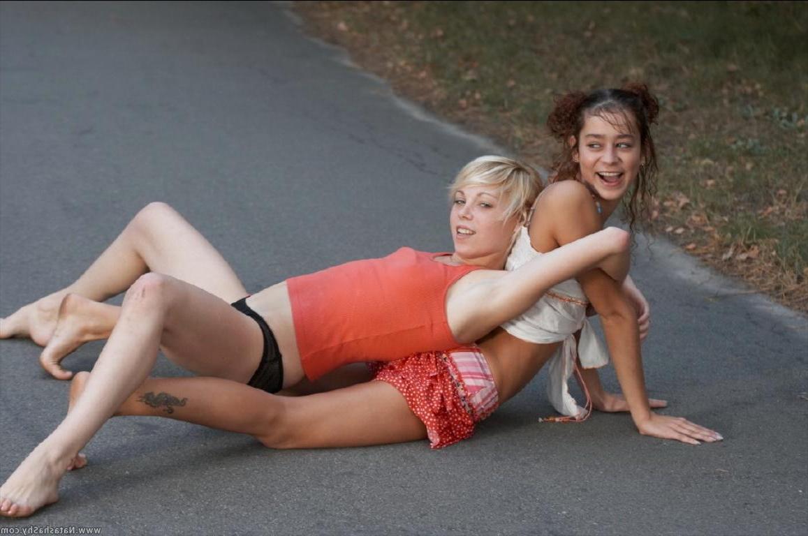 15P Pictures of Natasha Shy getting nude outside with her friend