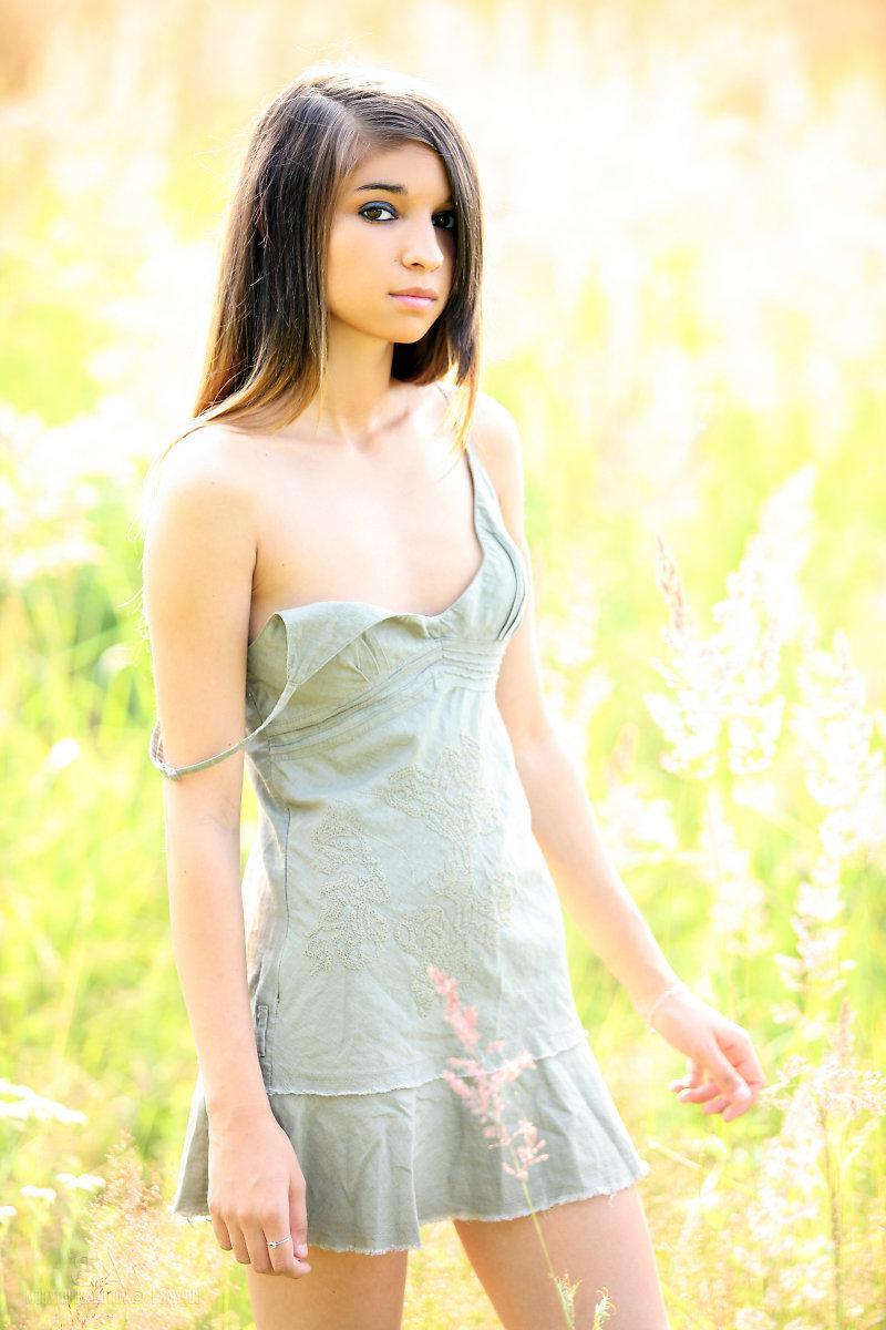16P Beautiful brunette teen Nika strips naked for you in the country