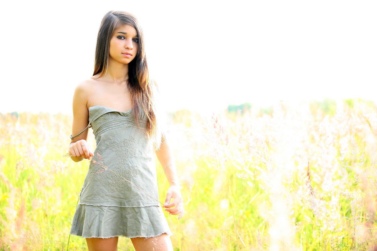 16P Beautiful brunette teen Nika strips naked for you in the country