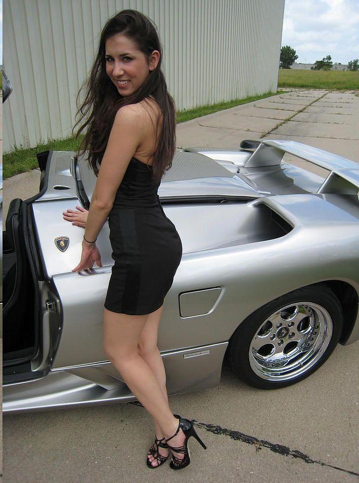 20P Pictures of Pretty Marie exposing herself with a car