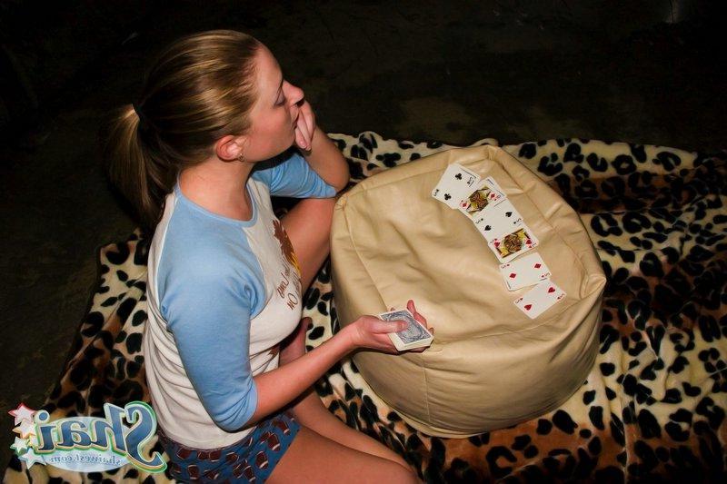 16P Pictures of teen Shai West loosing a game of strip solitaire
