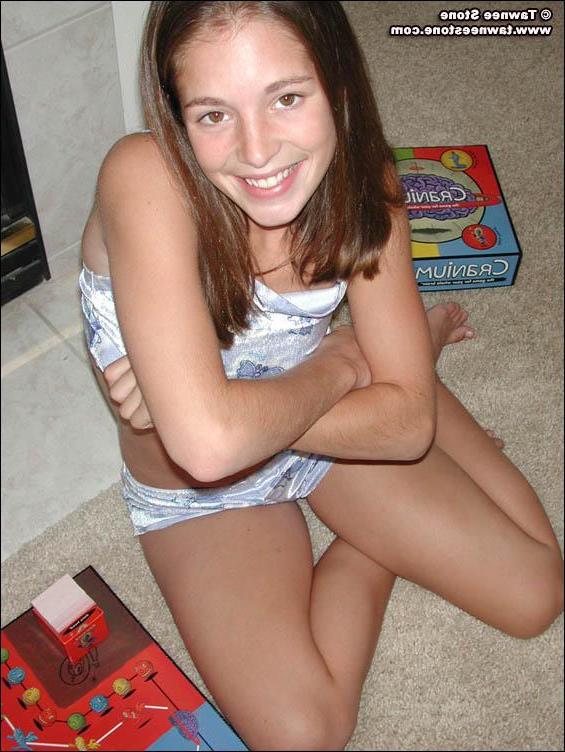 20P Pictures of Tawnee Stone playing a board game with herself