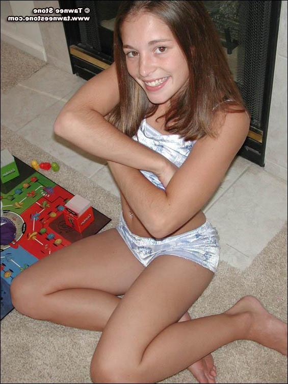 20P Pictures of Tawnee Stone playing a board game with herself
