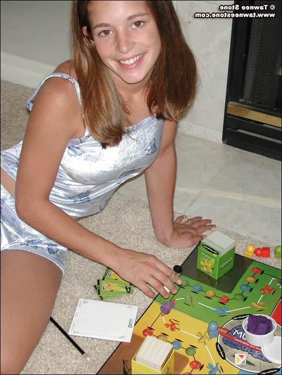 20P Pictures of Tawnee Stone playing a board game with herself
