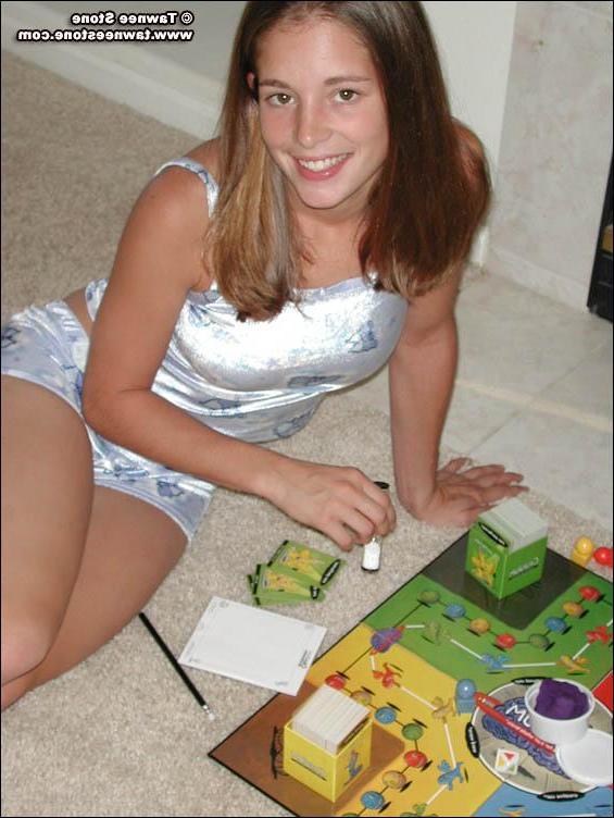 20P Pictures of Tawnee Stone playing a board game with herself