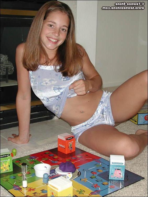 20P Pictures of Tawnee Stone playing a board game with herself