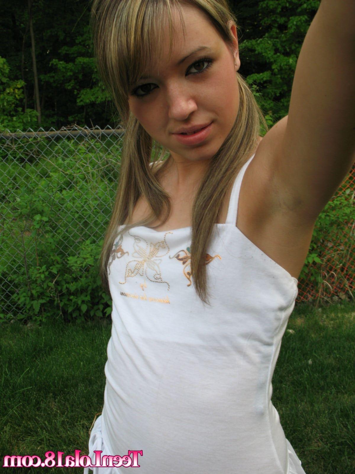 20P Pictures of a hot schoolgirl showing you her pussy outside