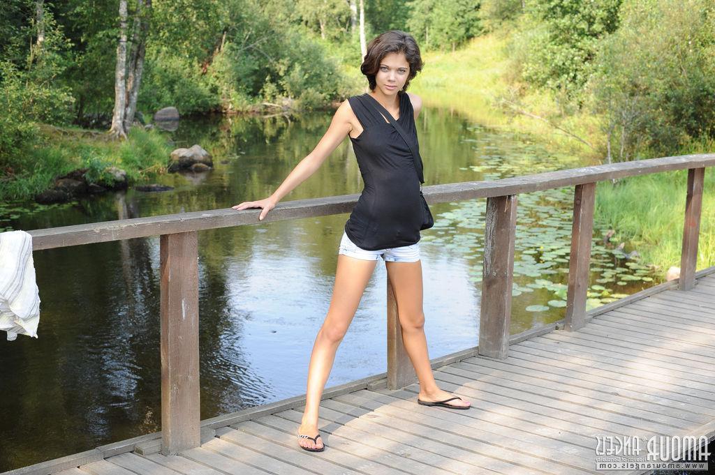 20P Brunette girl Tina F strips naked for you outside