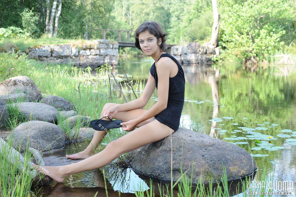 20P Brunette girl Tina F strips naked for you outside