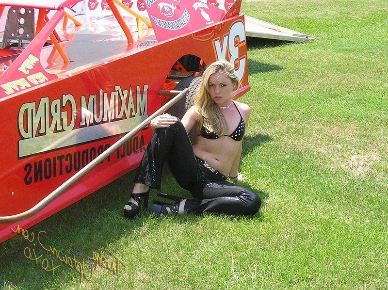 20P Pictures of Trisha Uptown teasing with a sports car