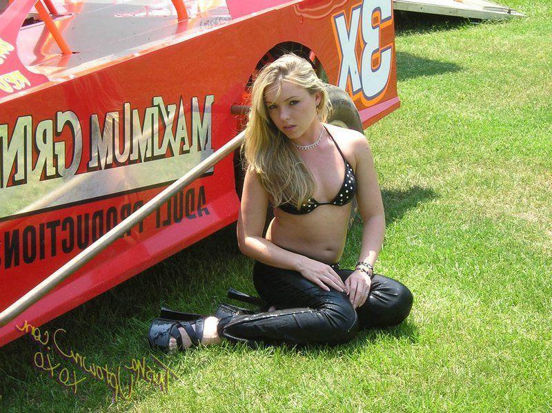 20P Pictures of Trisha Uptown teasing with a sports car