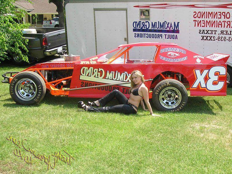 20P Pictures of Trisha Uptown teasing with a sports car