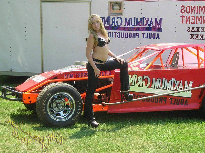 20P Pictures of Trisha Uptown teasing with a sports car
