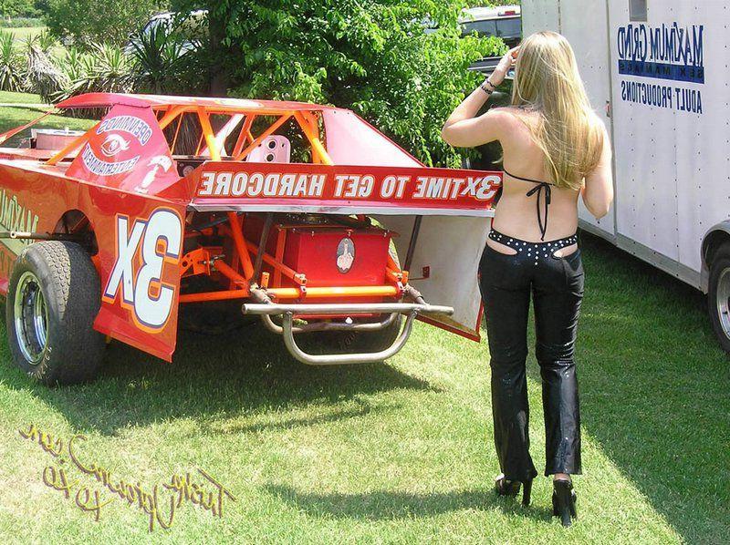 20P Pictures of Trisha Uptown teasing with a sports car