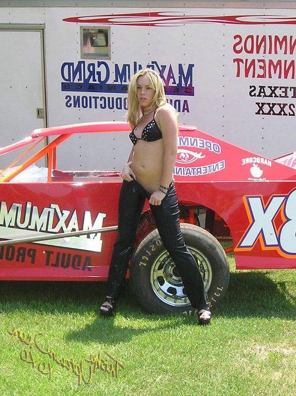 20P Pictures of Trisha Uptown teasing with a sports car