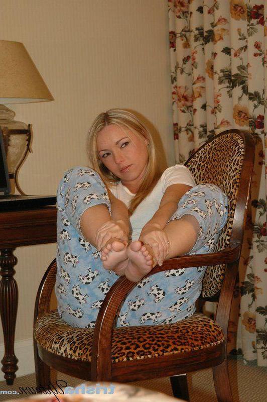 20P Pictures of Trisha Uptown having some feet and pussy play with her friend