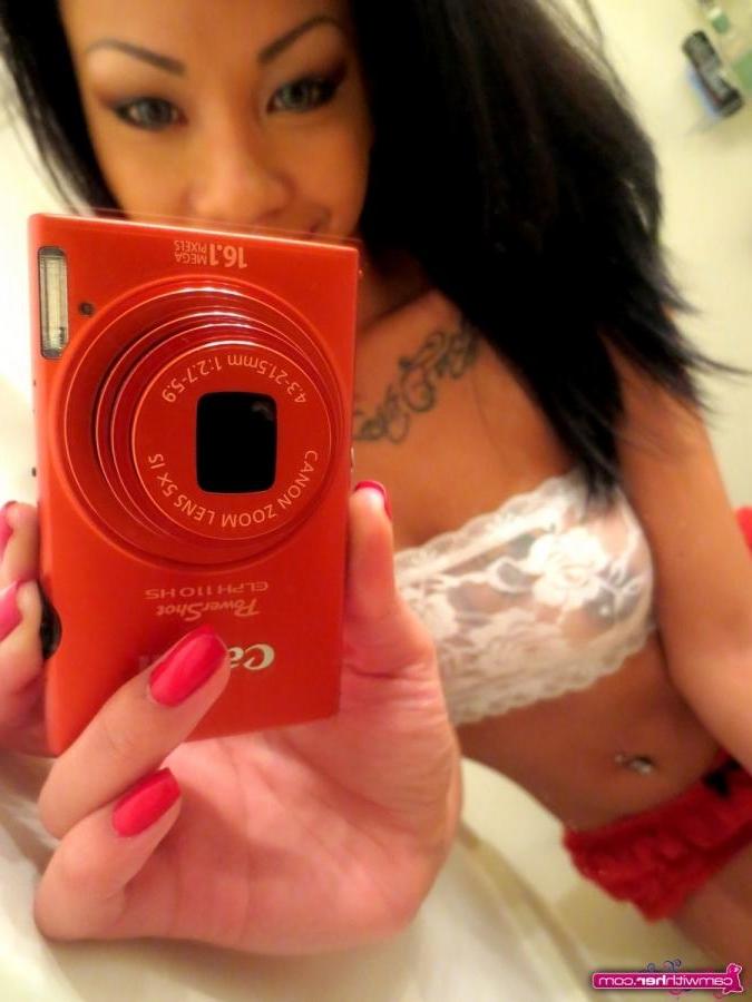 12P Sexy cam girl Veronica teases in a cute red and white lingerie set