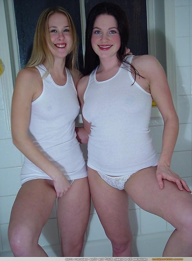 20P Pictures of teen Vicki Model getting all wet with her friend
