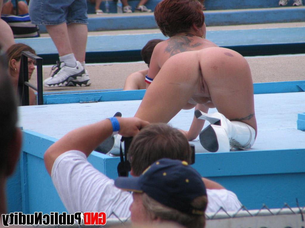 12P Big breasted blonde lets random people take pictures of her huge tits