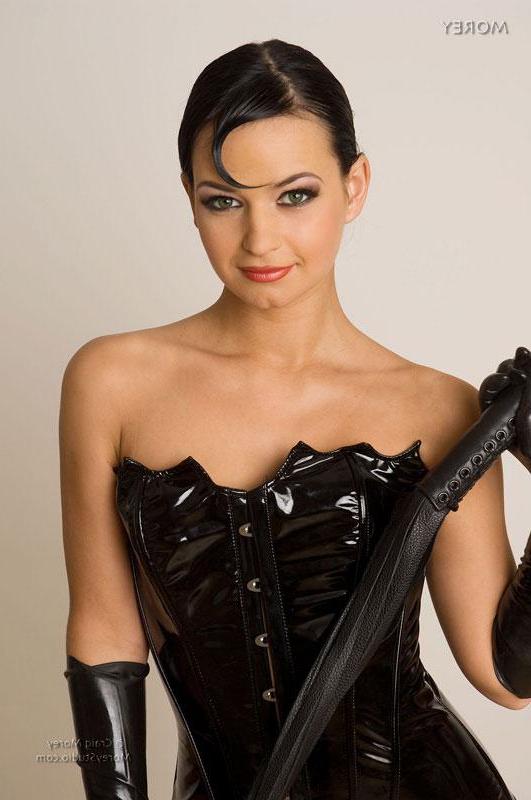 11P Brunette model Nea shows off her tight body in leather