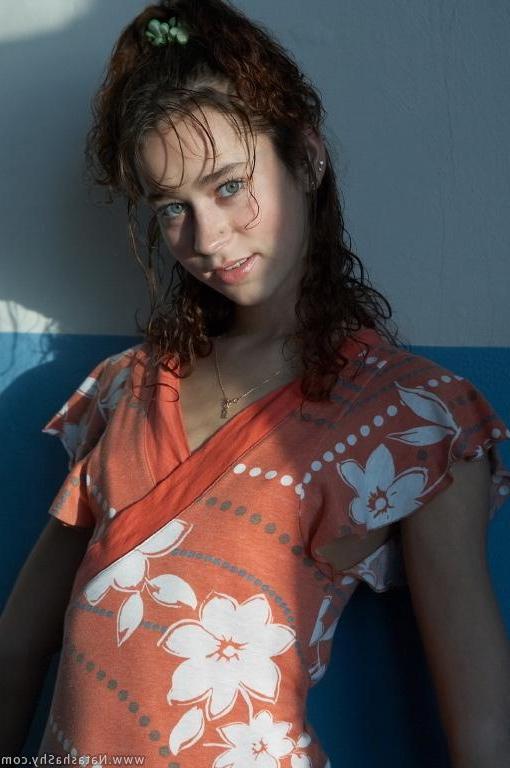 15P Pictures of Natasha Shy taking off her clothes