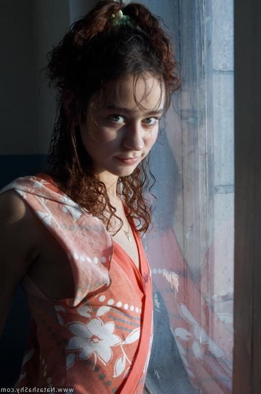 15P Pictures of Natasha Shy taking off her clothes