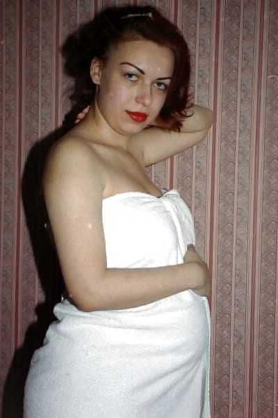 24P Pregnant brunette showing off her body and belly