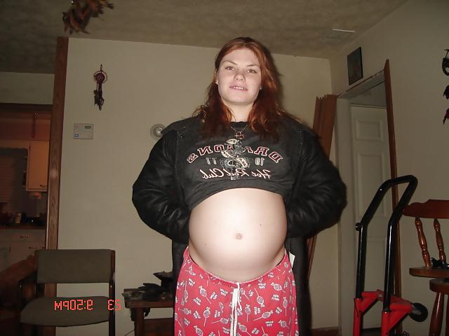 4P Pregnant chick flashes her tits and belly