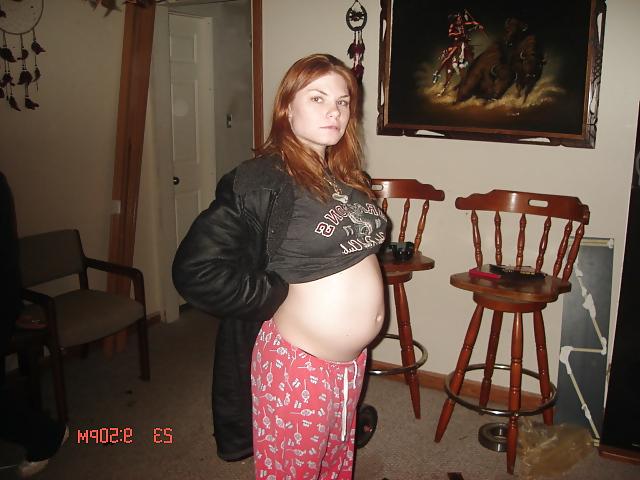 4P Pregnant chick flashes her tits and belly