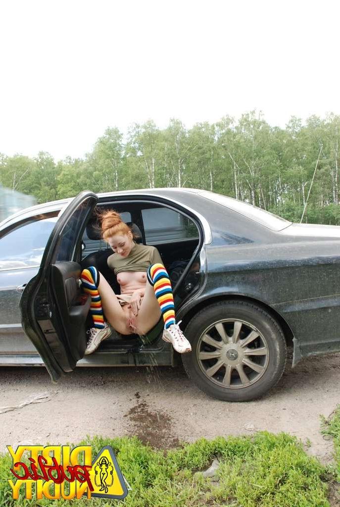 15P Milena pissing right from her car