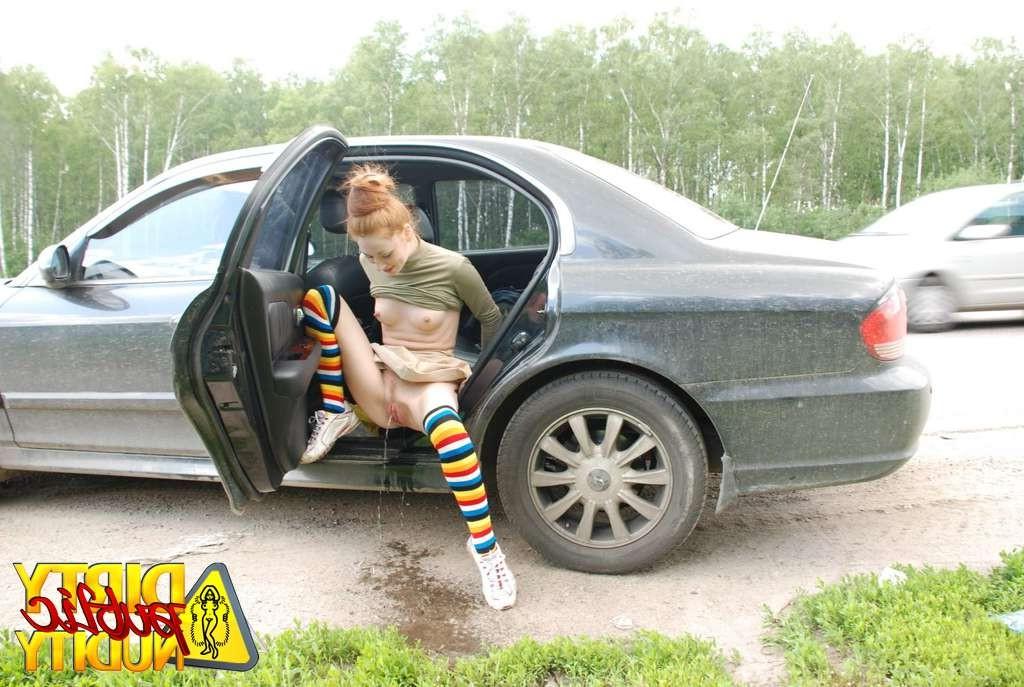 15P Milena pissing right from her car