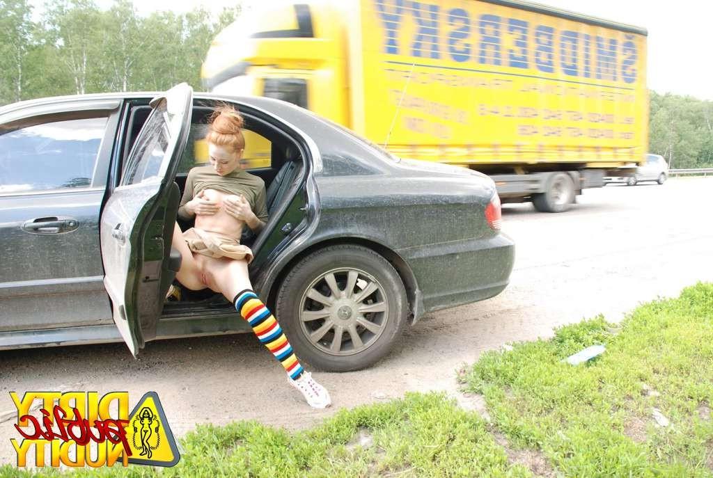 15P Milena pissing right from her car