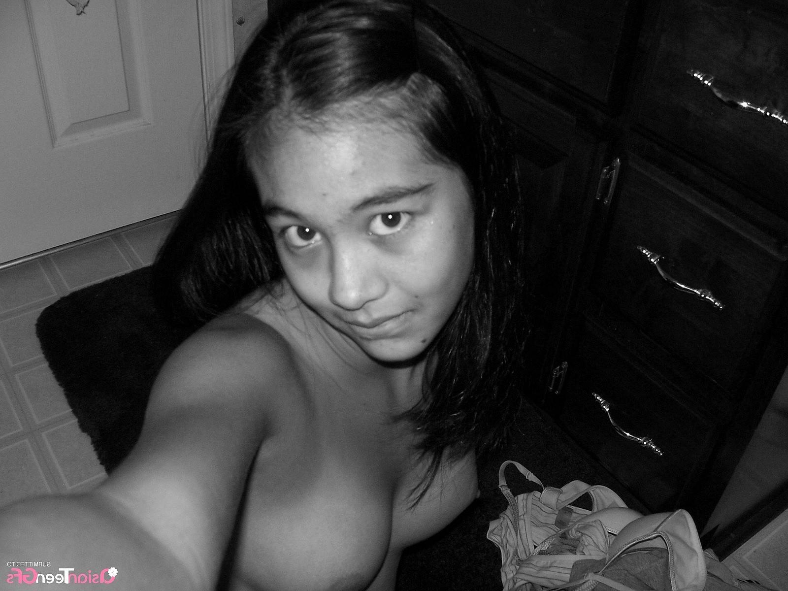 18P Perfect asian teen babe spreads her legs to show tight pussy