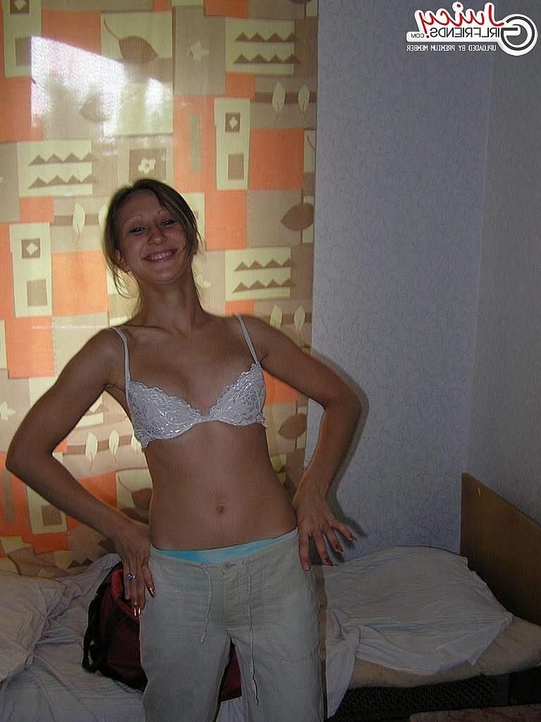 10P Cute teen posing in dorm room