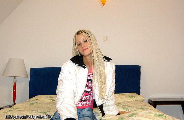 12P Sexy skinny blonde plays with her kitty for the camera