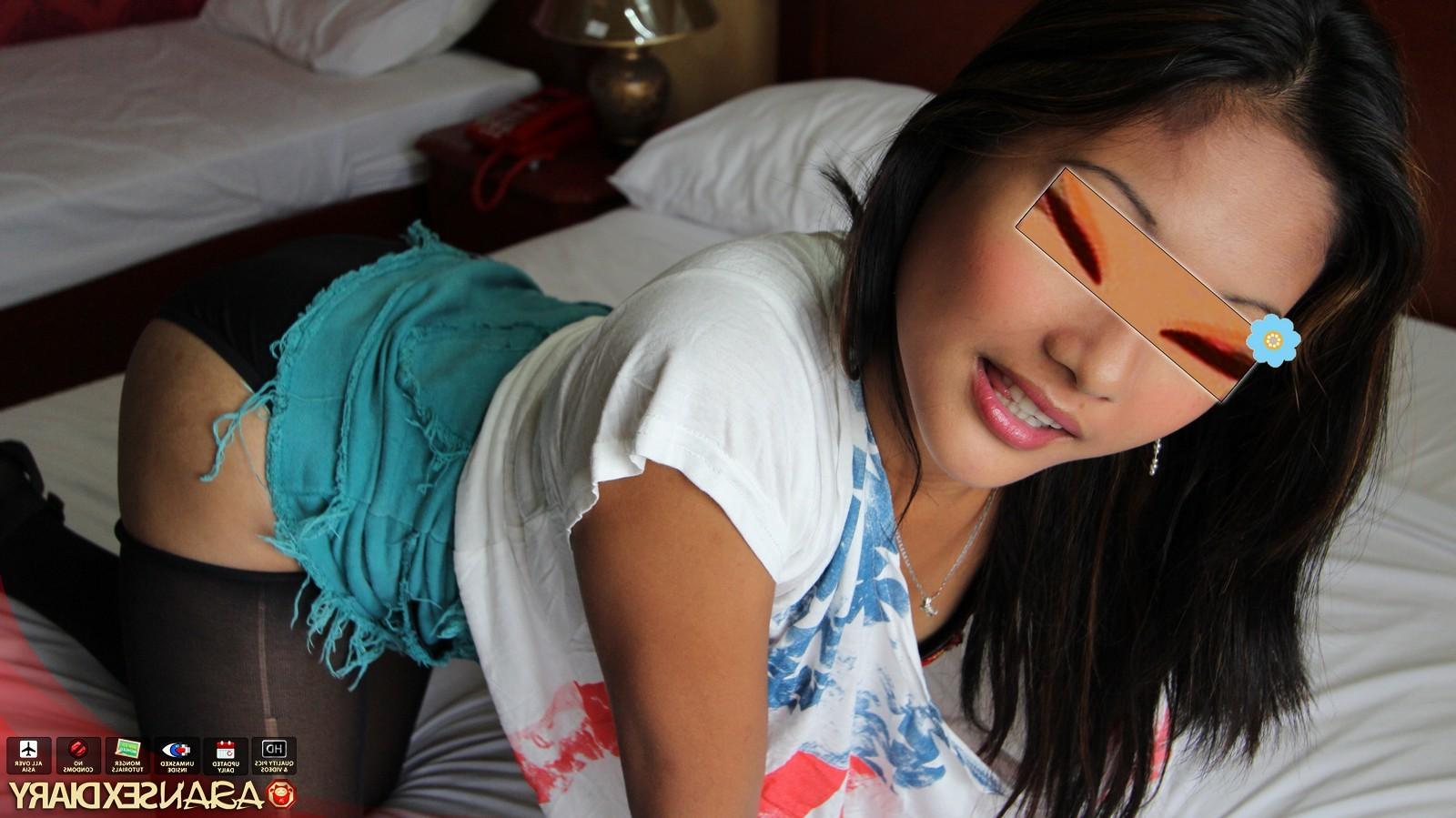 15P Sexy Asian babe in stockings strips and fucks a white tourist