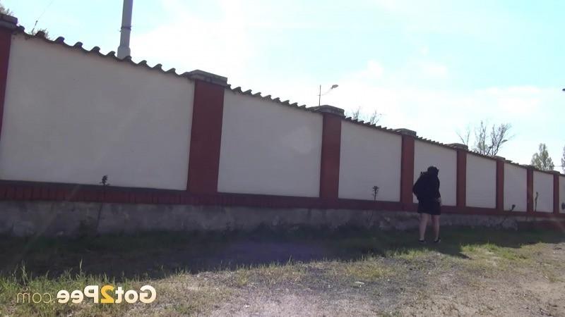 15P Shy girl pees outside on concrete steps