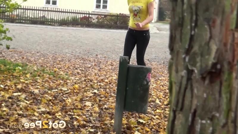 15P Pretty teen pisses in the middle of a public park